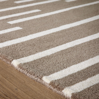 Broken Stripe- hand-tufted wool cut pile rug in Brown and White with a broken striped design.