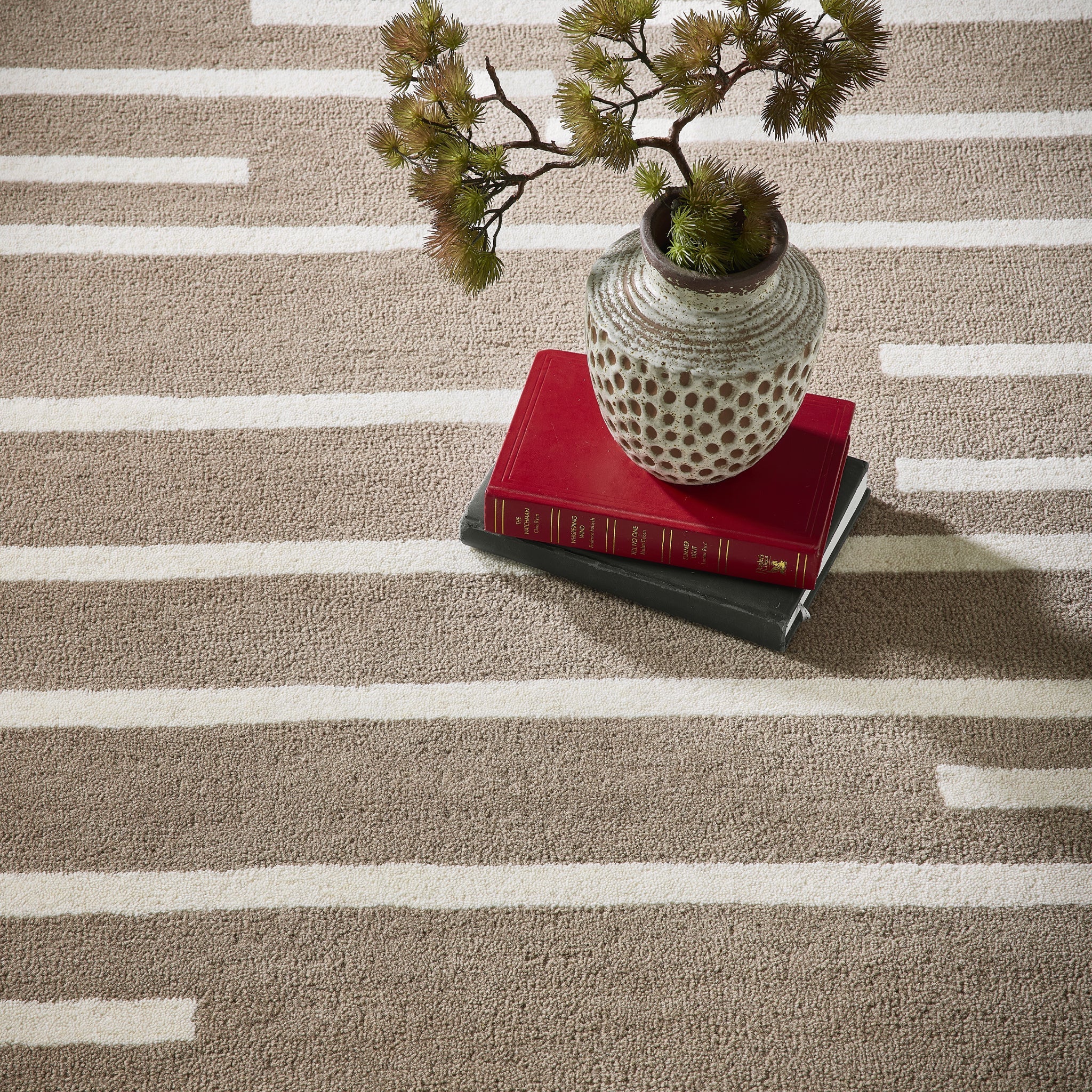 Broken Stripe- hand-tufted wool cut pile rug in Brown and White with a broken striped design.