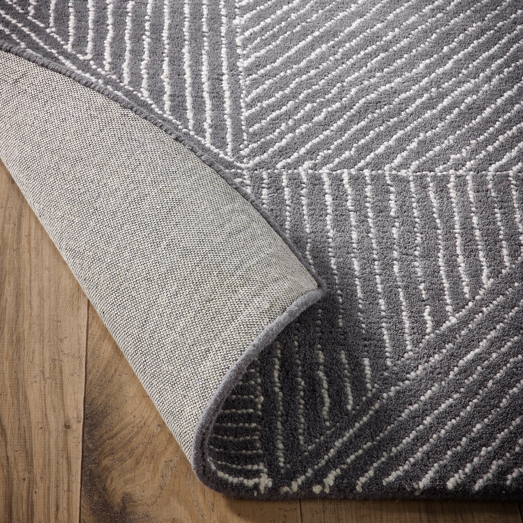 Geometric Rug- 100% wool cut pile rug with a geometric pattern.