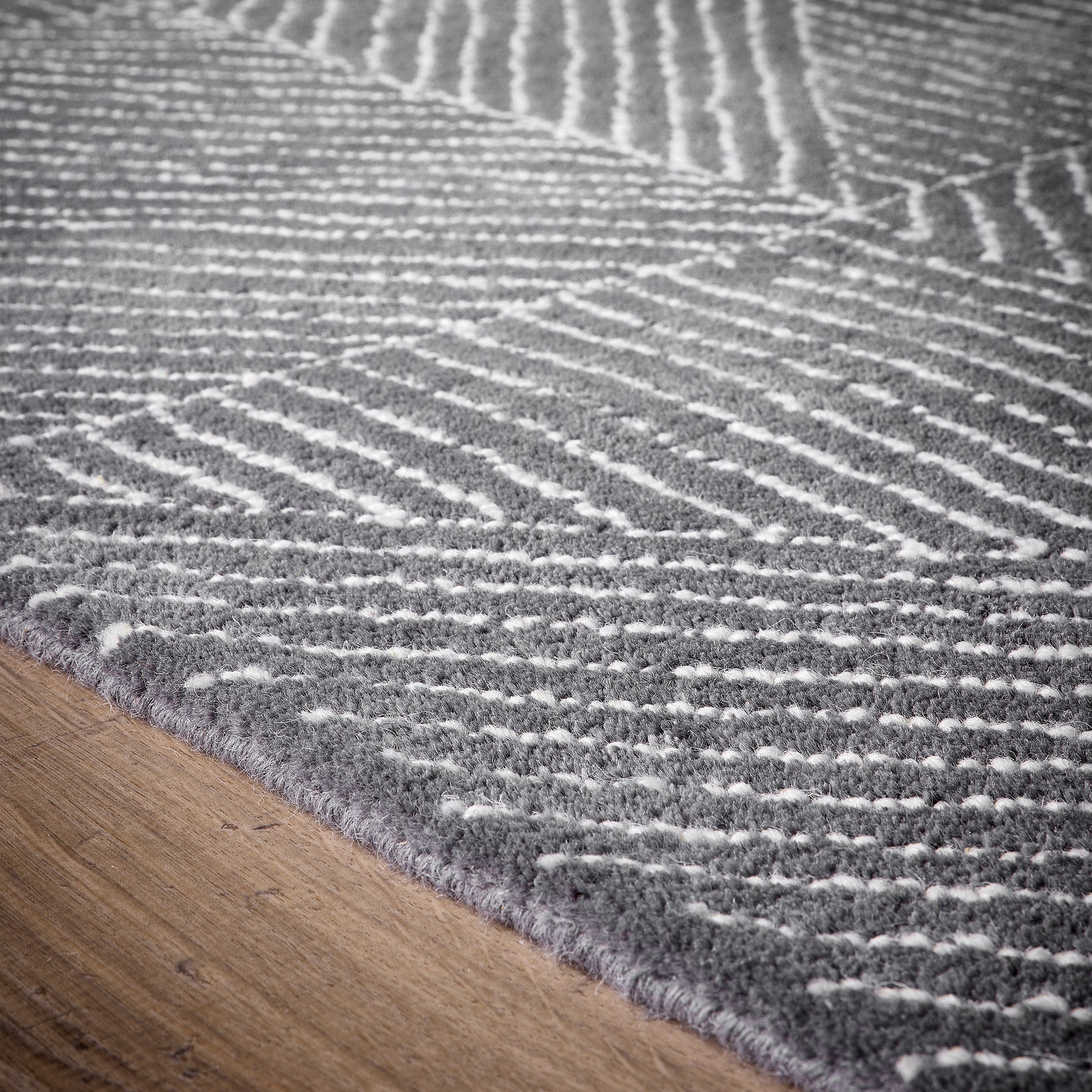 Geometric Rug- 100% wool cut pile rug with a geometric pattern.