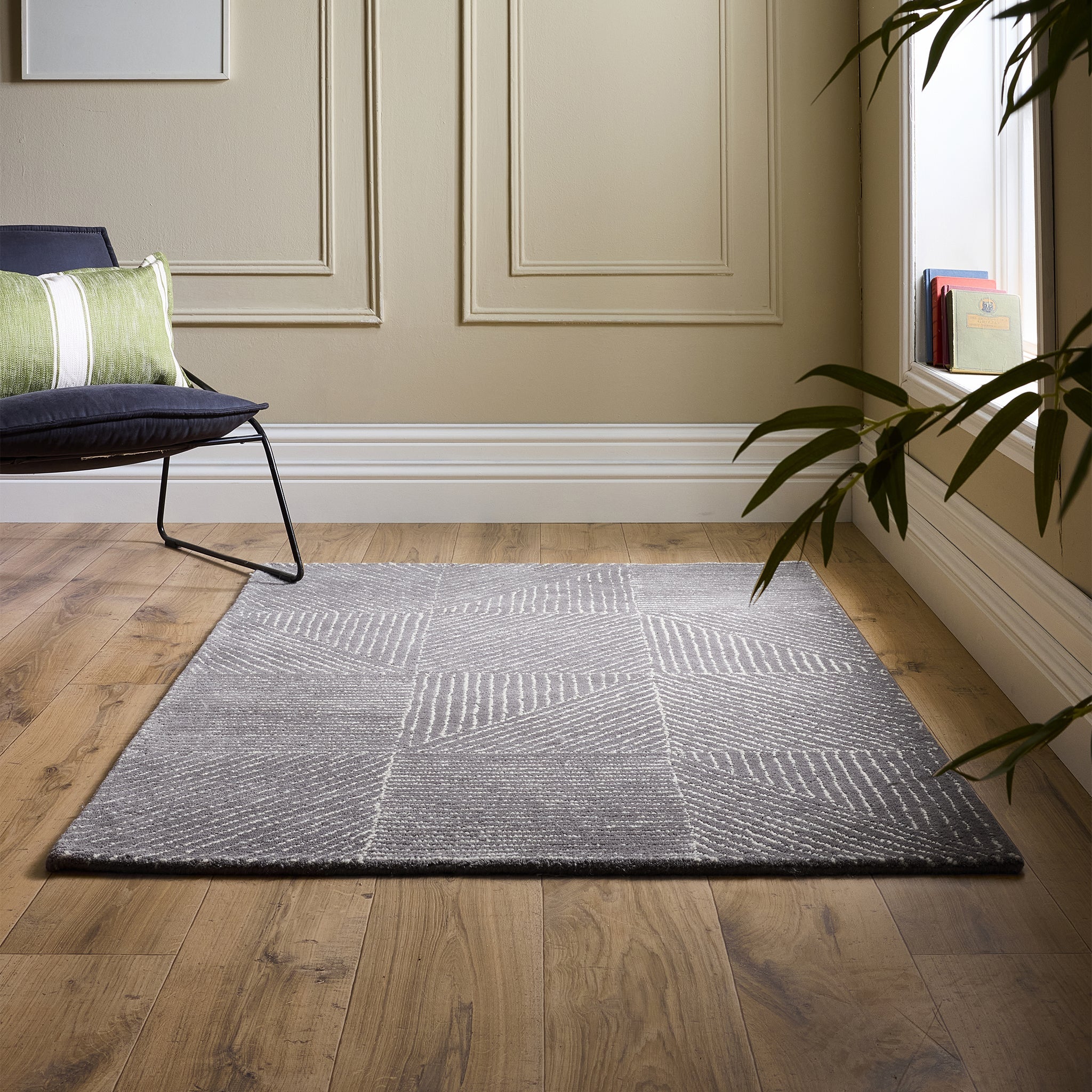 Geometric Rug- 100% wool cut pile rug with a geometric pattern.