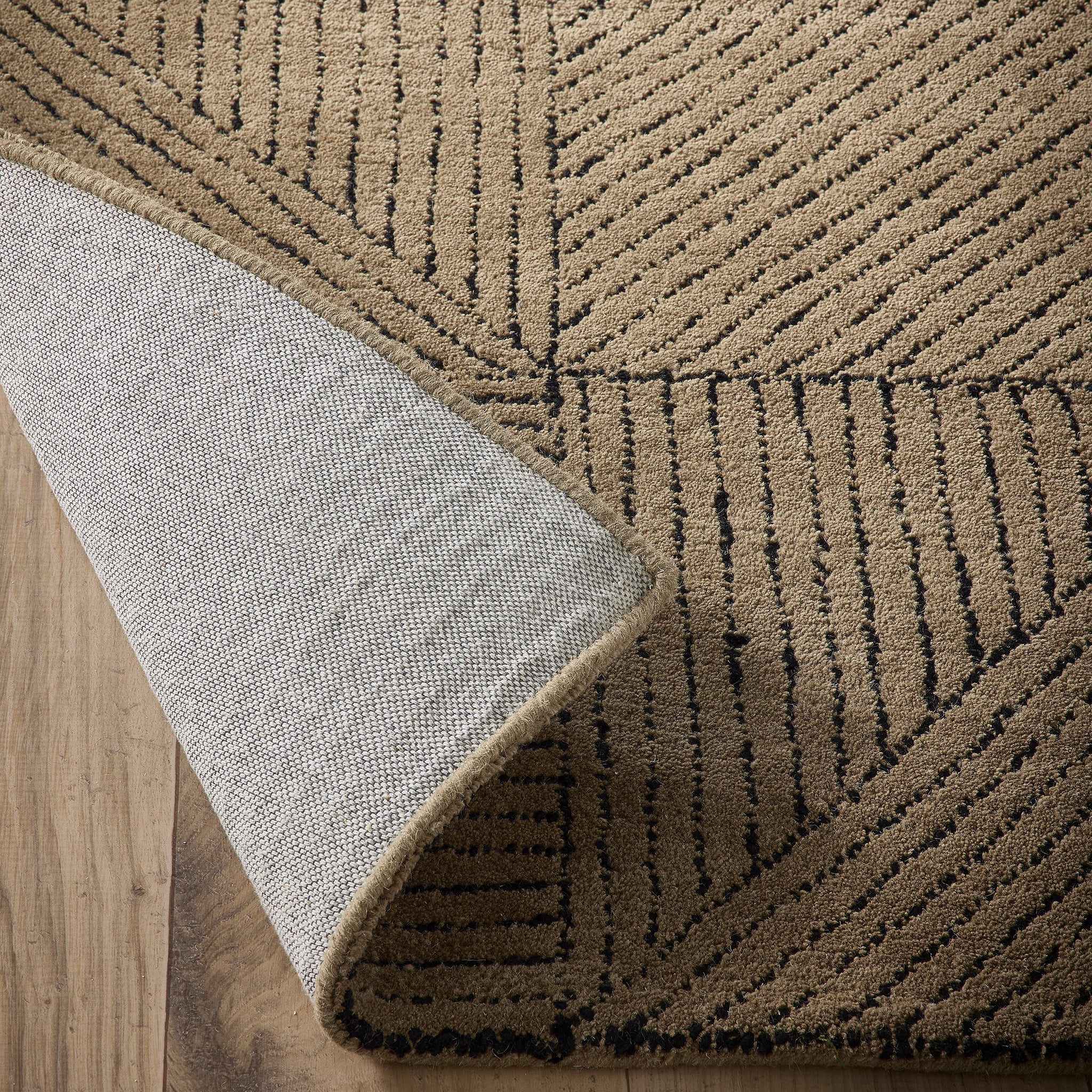 Geometric Rug- hand-tufted rug in Sand with a geometric pattern.