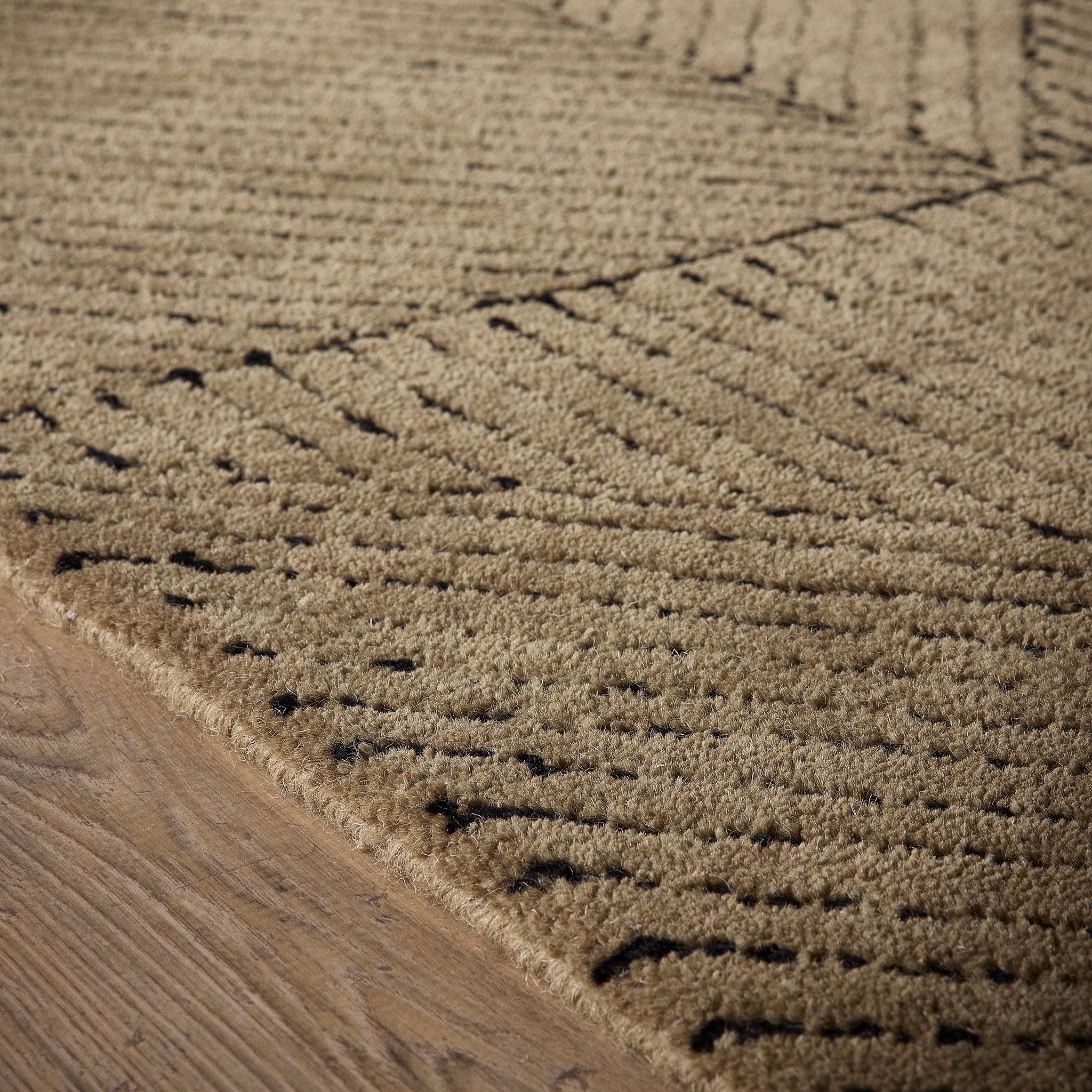 Geometric Rug- hand-tufted rug in Sand with a geometric pattern.