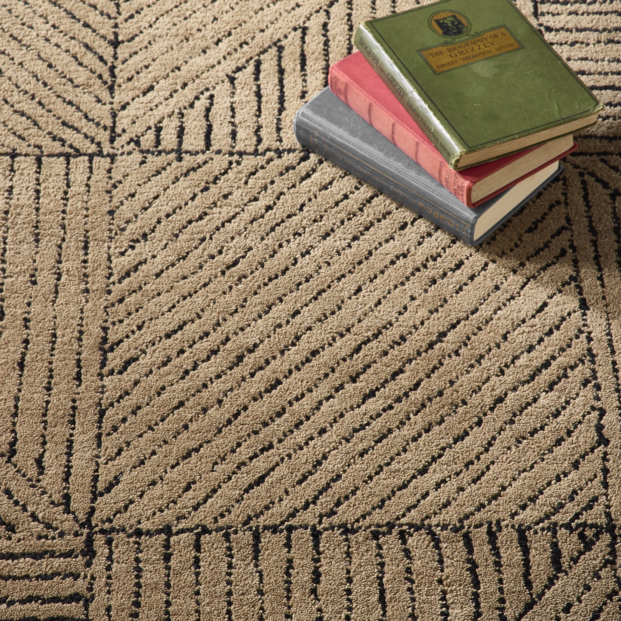 Geometric Rug- hand-tufted rug in Sand with a geometric pattern.