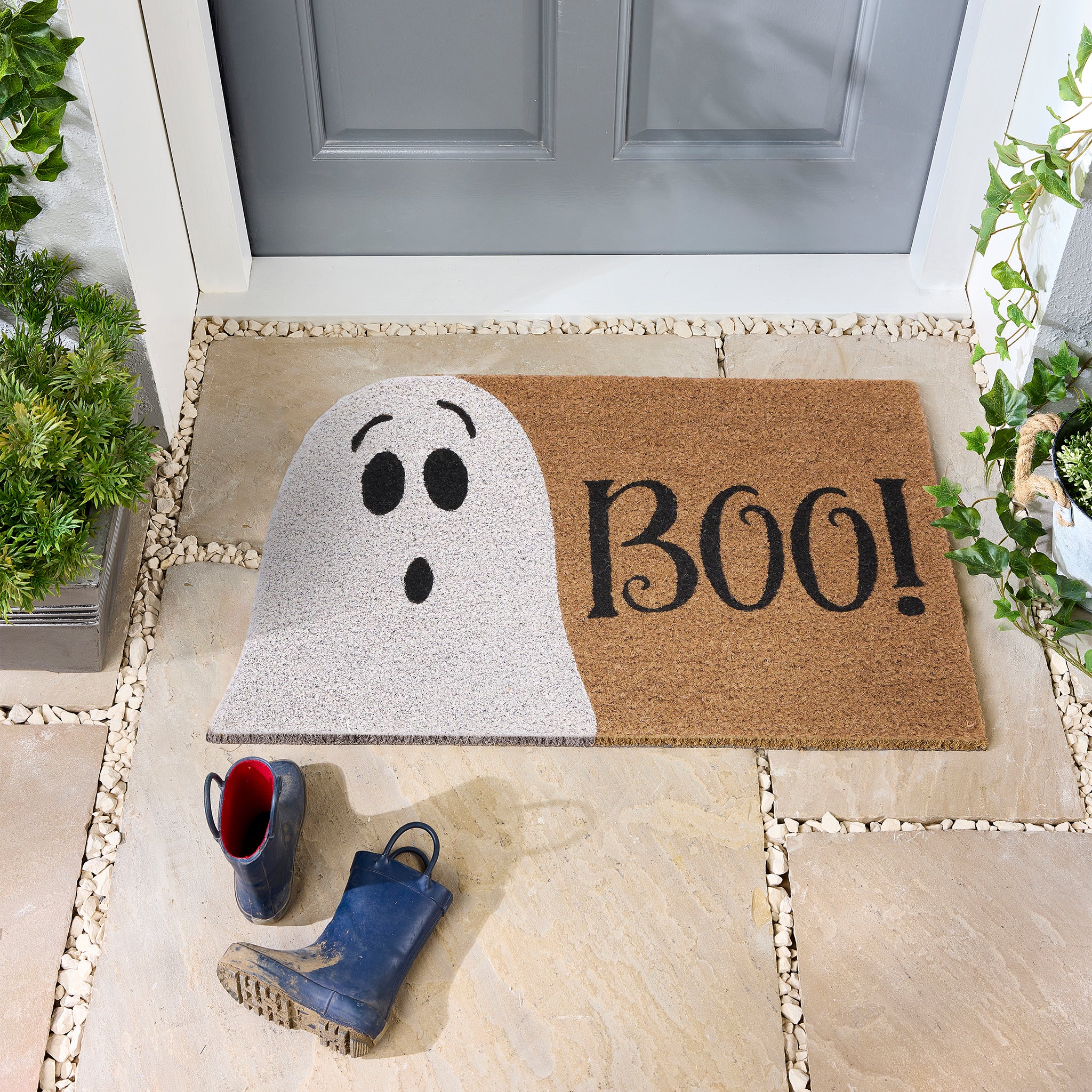 Discover the Halloween Boo Coir Doormat- a coir doormat featuring a white ghost and graphic font.