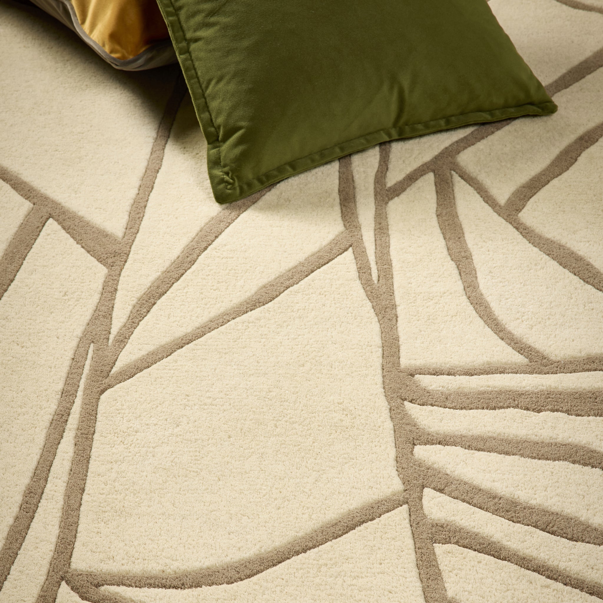Kintsugi- 100% Wool Cut Pile rug in Cream with a carved pattern.