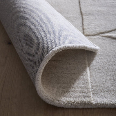 Penny Rug – 100% wool hand-tufted rug in Infinity blue with sculpted 3D geometric pattern.
