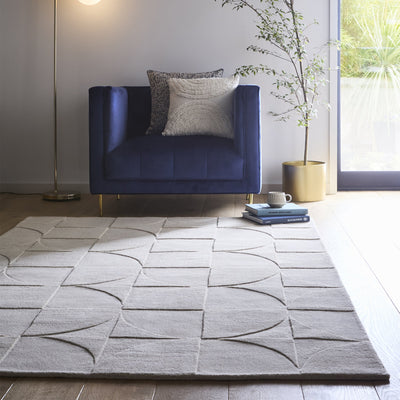 Penny Rug – 100% wool hand-tufted rug in Infinity blue with sculpted 3D geometric pattern.