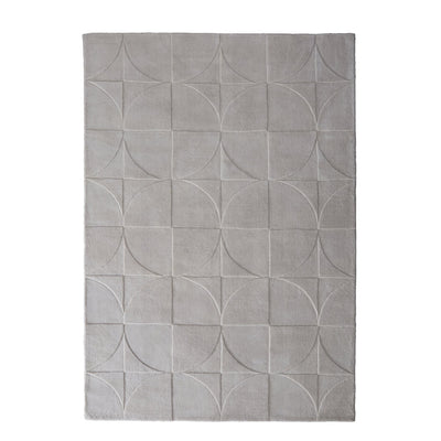 Penny Rug – 100% wool hand-tufted rug in Infinity blue with sculpted 3D geometric pattern.