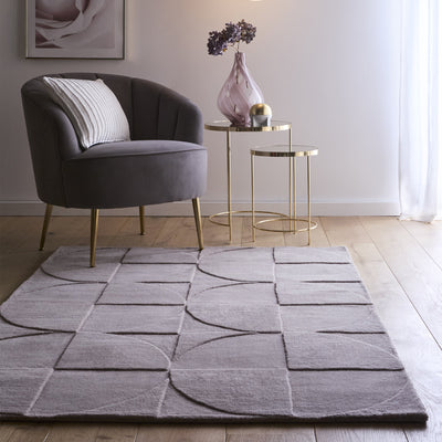 Penny Rug – 100% wool hand-tufted rug in Infinity blue with sculpted 3D geometric pattern.