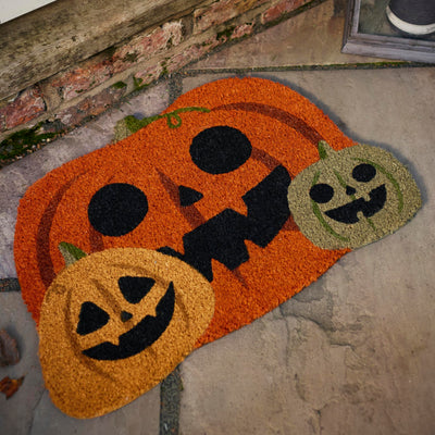 Discover the Pumpkin Halloween Coir Doormat in Orange- a coir mat with a graphic pumpkin design.