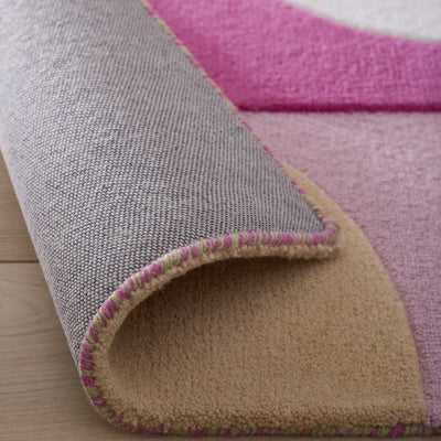 Retro deco - 100% wool cut loop pile, hand-tufted rug in pink with a sculptured 3D geometric pattern.