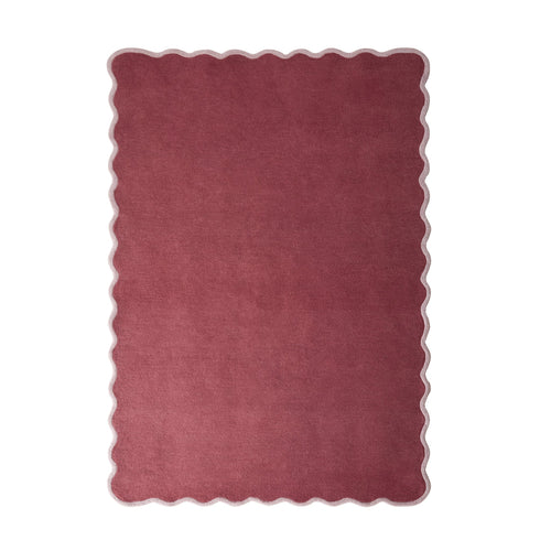 Scalloped Elise- 100% wool cut & loop pile rug in Coral and Lilac with a thick border.