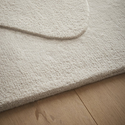 Sculptured Wool Rug- 100% Wool Cut pile, hand-tufted rug with a patterned design.