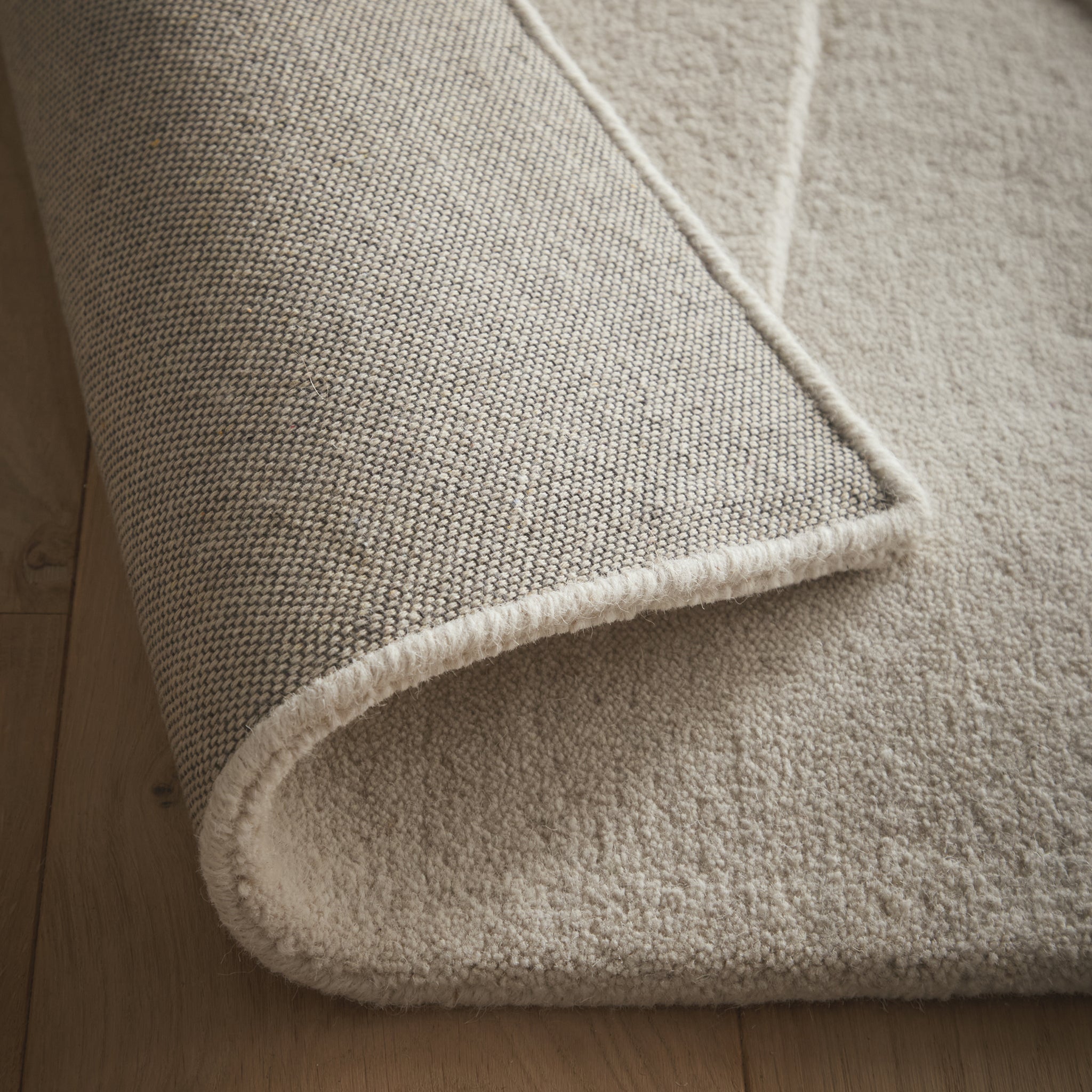Sculptured Wool Rug- 100% Wool Cut pile, hand-tufted rug with a patterned design.