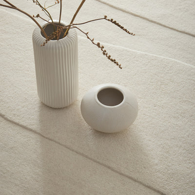 Sculptured Rug- 100% wool cut pile rug in Cream with a sculptured pattern.