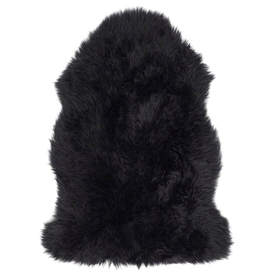 Single Sheepskin rug in black overhead on white background