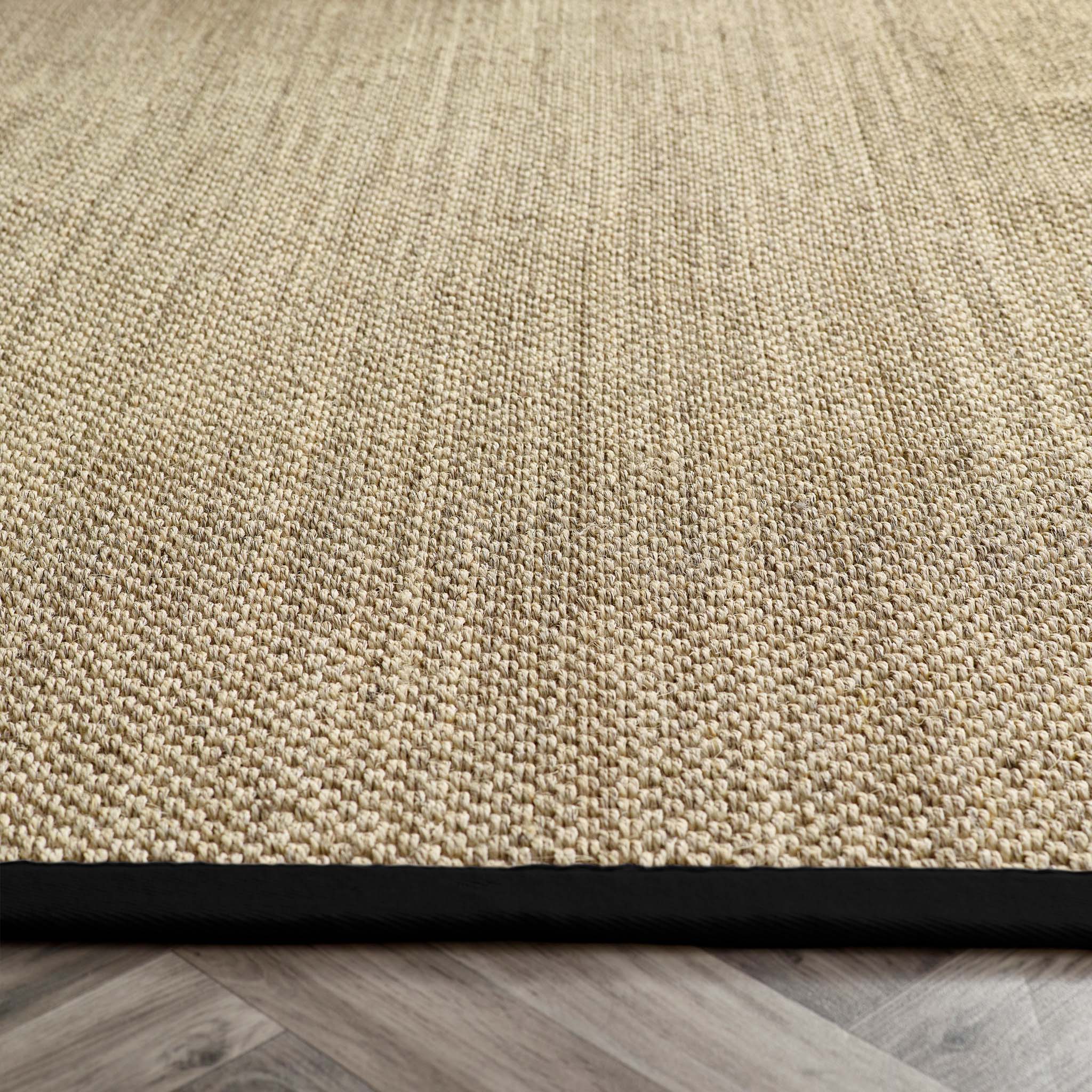 Sisal Rug- 100% Sisal rug with a black border.