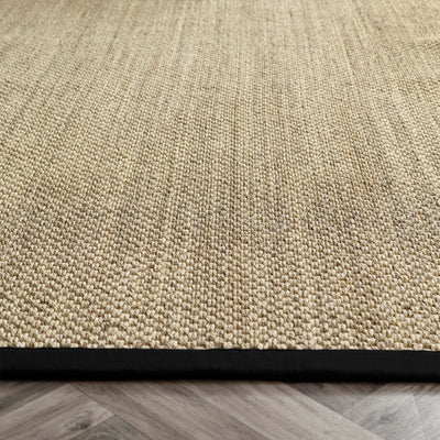 Sisal Rug- 100% Sisal rug with a black border.