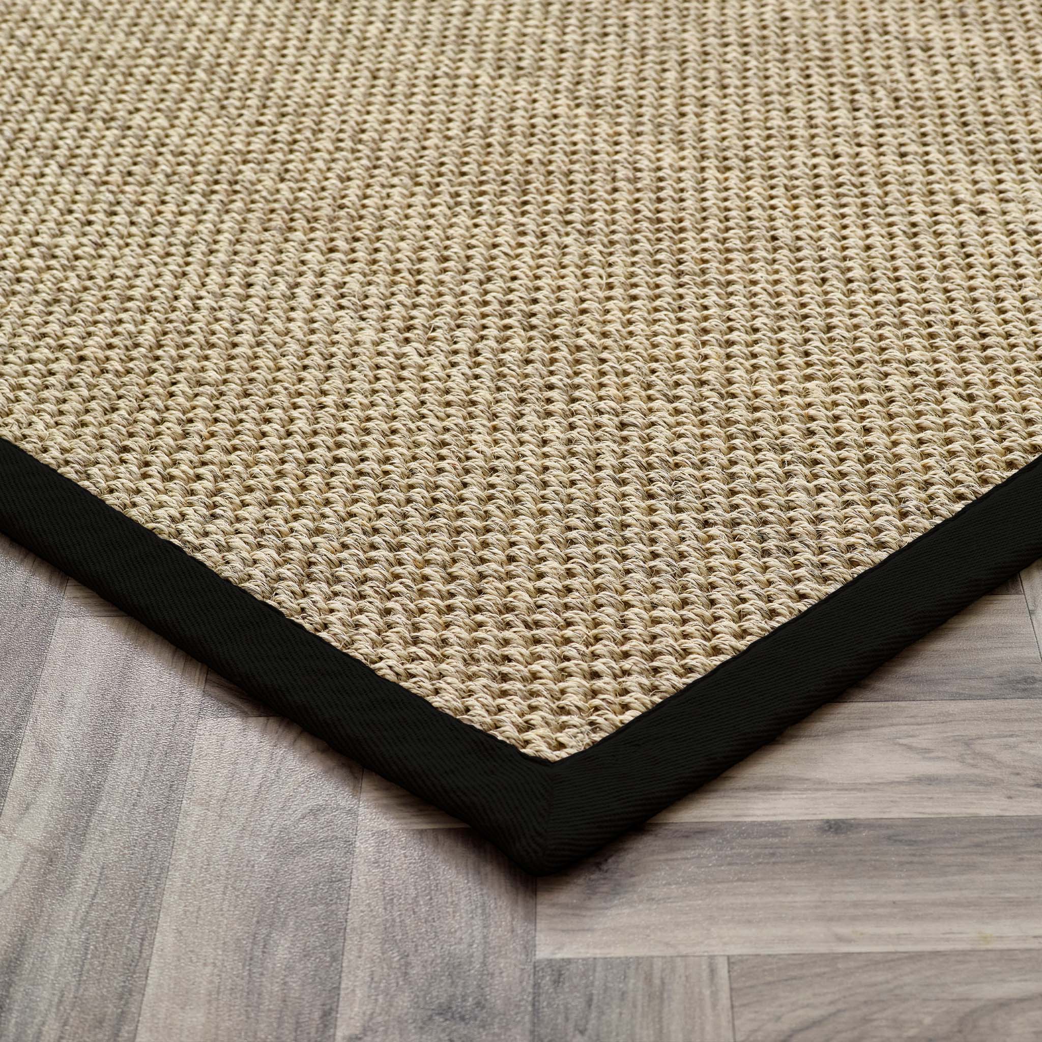 Sisal Rug- 100% Sisal rug with a black border.