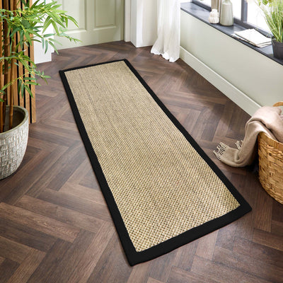 Sisal Rug- 100% Sisal rug with a black border.