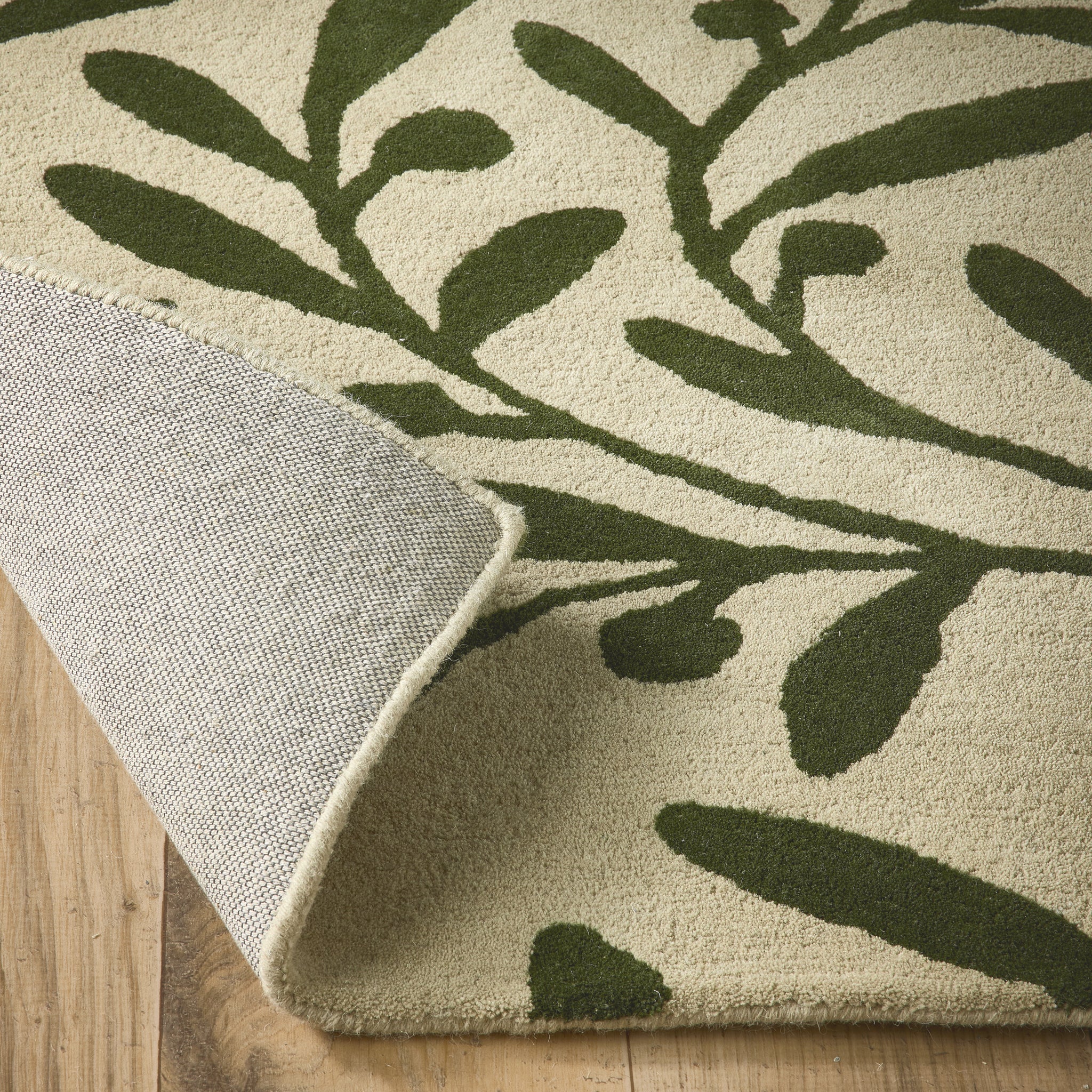 Trailing Leaf Rug - 100% wool cut pile, hand tufted and carved with leaf design.