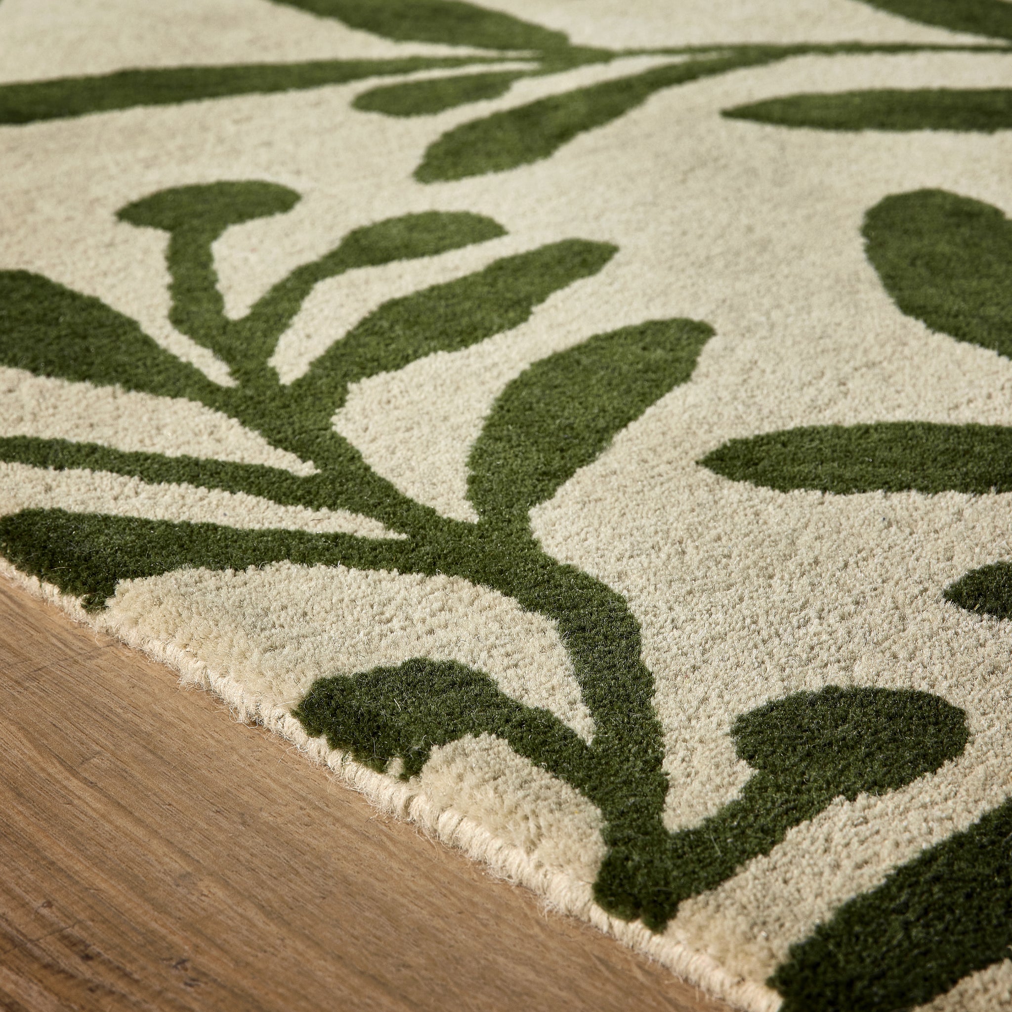 Trailing Leaf Rug - 100% wool cut pile, hand tufted and carved with leaf design.