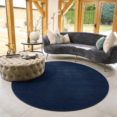 a navy blue sense washable rug from hug at home