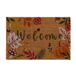 Discover the Autumnal Welcome Coir Doormat- a coir doormat featuring leaves, berries, pumpkins and mushrooms with a graphic font. 