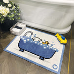 Lifestyle image of a Bathtime Herdy washable bath mat from Hug Rug next to a bath tub