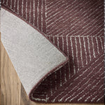 Geometric Rug- 100% Wool cut pile rug in Berry with a 3D pattern. 