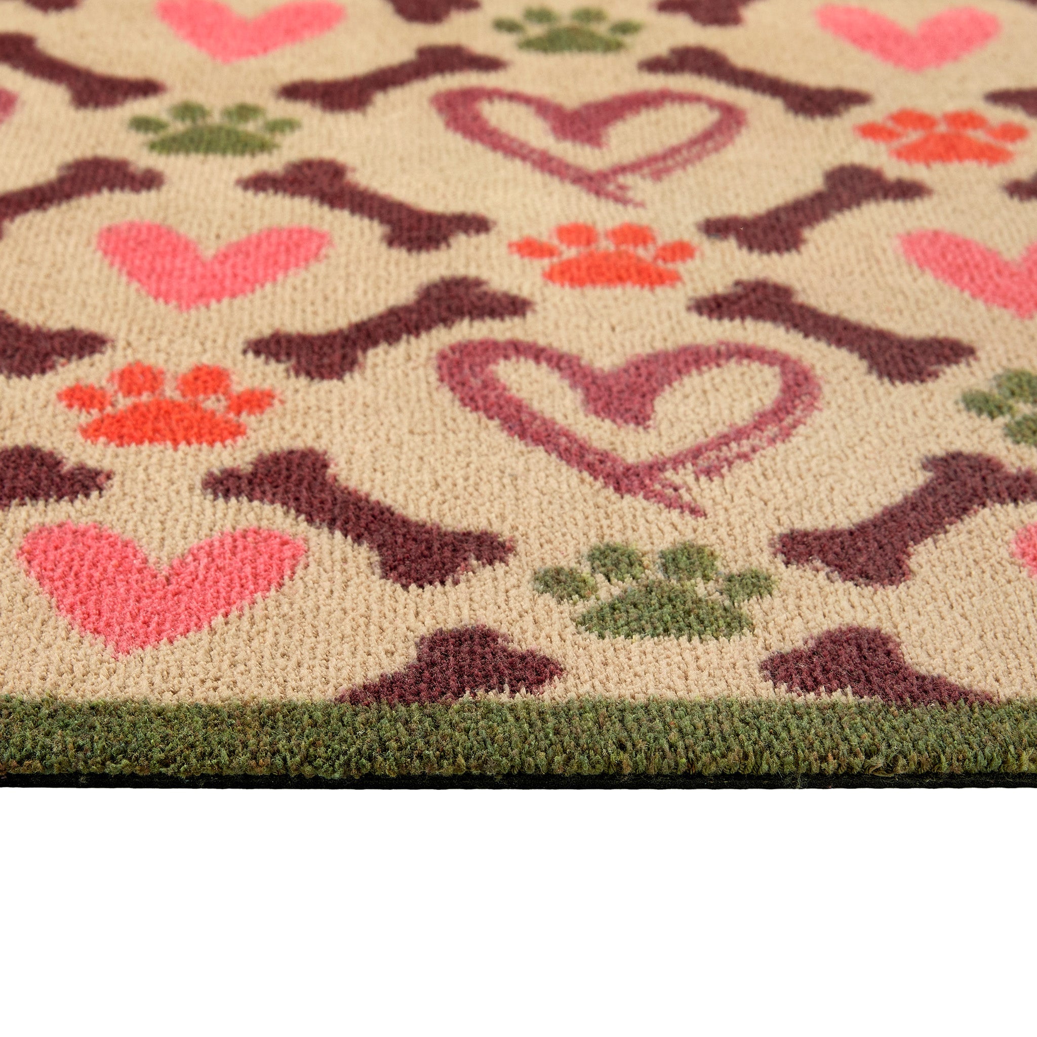 Close up of Hug Rug beige hearts and bones washable doormat pattern and texture