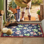 Hedgerow and berries pattern on washable doormat in doorway 