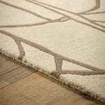 Kintsugi- 100% Wool Cut Pile rug in Cream with a carved pattern.