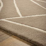 Kintsugi Rug- 100% wool cut pile, hand-tufted and carved rug in Stone with a carved design. 