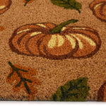 Discover the Multi Pumpkins Coir Doormat- a coir doormat with pumpkins and green\orange leaves. 