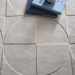 Penny Rug – 100% wool hand-tufted rug in Infinity blue with sculpted 3D geometric pattern.