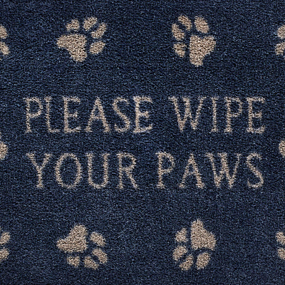 Close up image of the please wipe your paws text and pattern on a navy Pet 10 washable doormat from Hug Rug