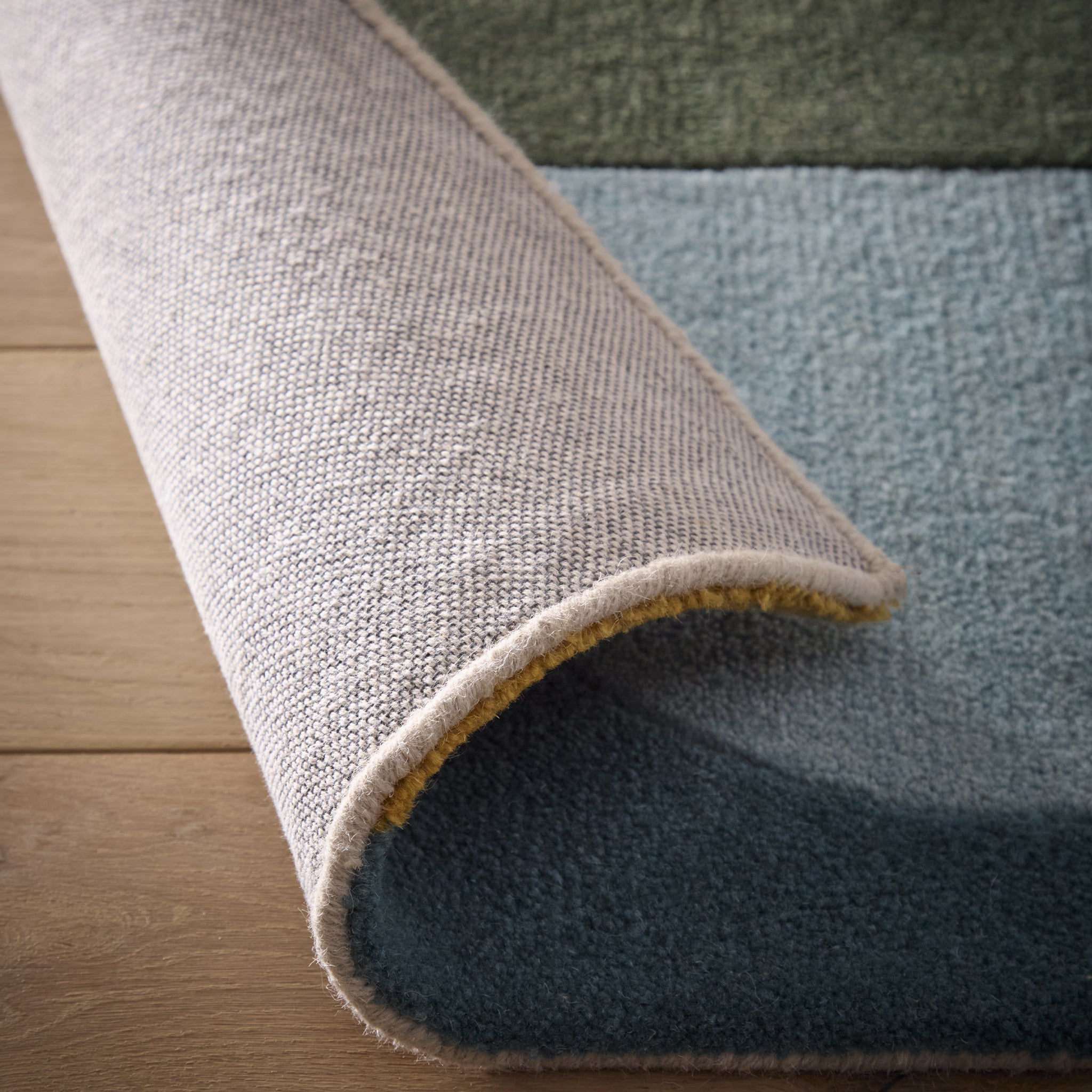 Retro Deco- 100% wool cut & looped pile, hand-tufted rug in multi with a geometric design. 