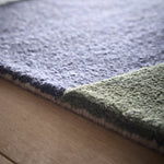 Retro Deco- 100% wool cut & looped pile, hand-tufted rug in multi with a geometric design. 
