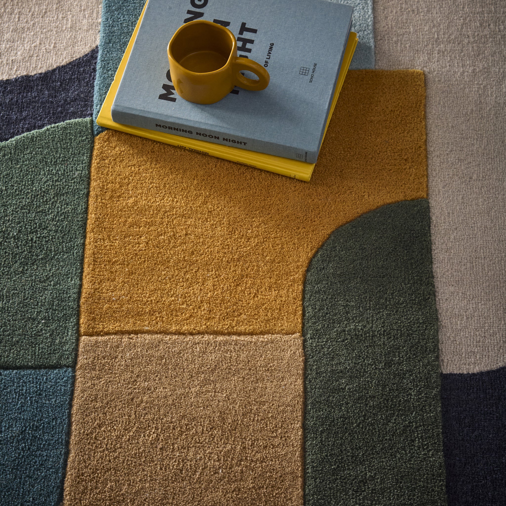 Retro Deco- 100% wool cut & looped pile, hand-tufted rug in multi with a geometric design. 