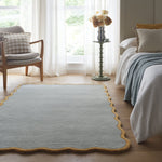 Scalloped Elsie Rug- a 100% hand-tufted rug in Duck Egg with wavy border. 