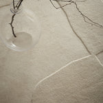Sculptured Wool Boulder Rug- a 100% wool cut pile rug in Cream with a patterned design. 