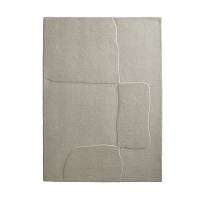 Sculptured Wool Boulder Rug- a 100% wool cut pile rug in Cream with a patterned design. 