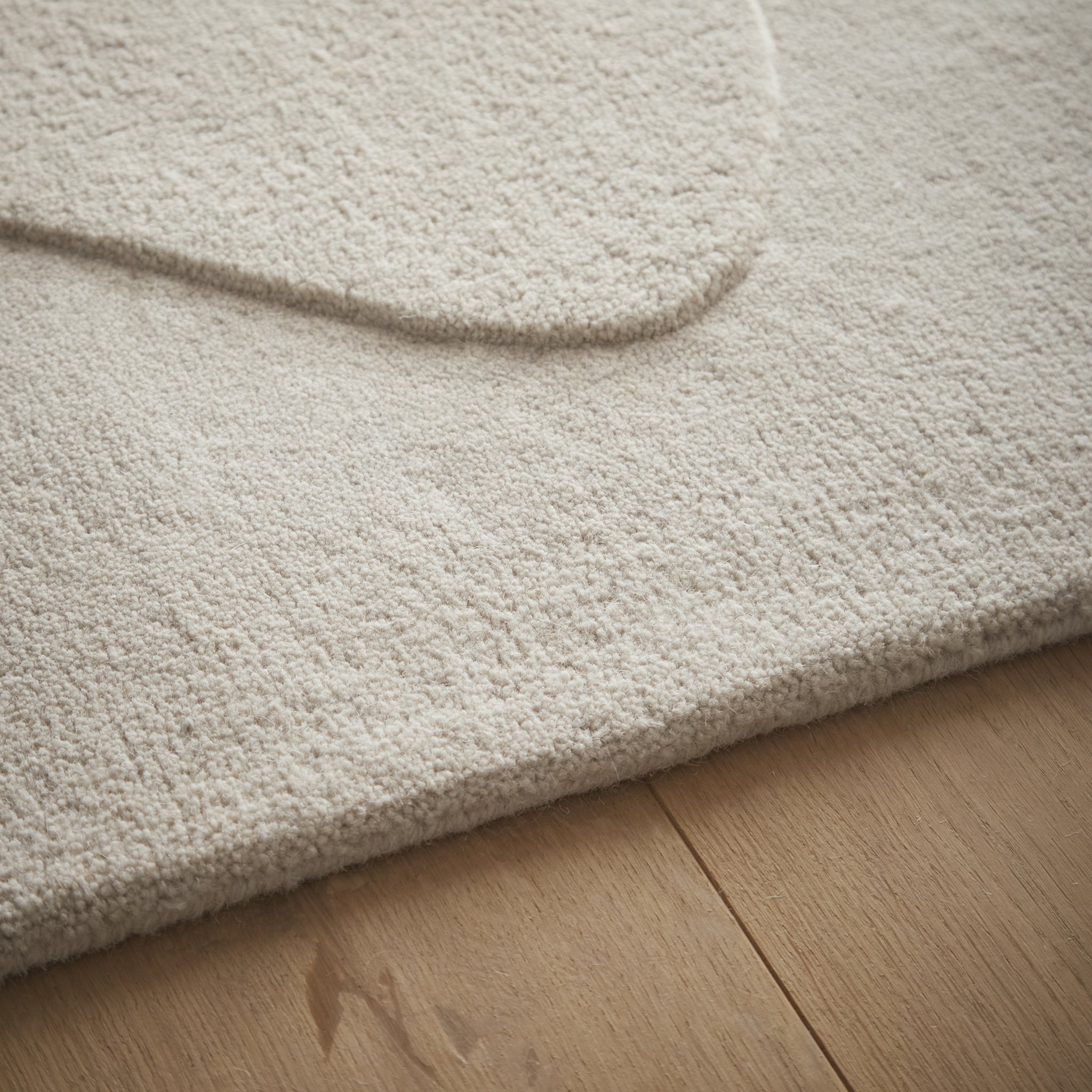 Sculptured Wool Rug- 100% Wool Cut pile, hand-tufted rug with a patterned design. 