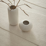 Sculptured Rug- 100% wool cut pile rug in Cream with a sculptured pattern. 
