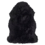 Single Sheepskin rug in black overhead on white background