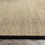 Sisal Rug- 100% Sisal rug with a black border. 