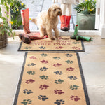 Lifestyle image of dog walking on Hug Rug beige wipe your paws washable doormat and washable runner